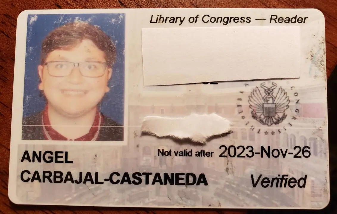 my library of congress card with a little paper to hide my signature and barcode